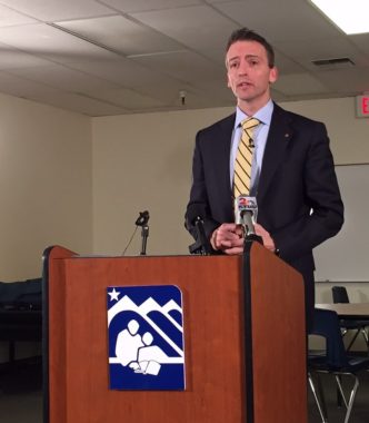 Superintendent Ed Graff speaking at a podium