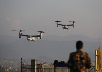 U.S. Osprey tilt-rotor aircraft arrive Sunday at the Tribhuvan International airport in Kathmandu, Nepal. (Photo by Niranjan Shrestha/AP)
