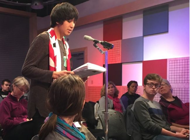 At a recent local municipal candidate debate, David Russell-Jensen asks school board candidates if they'd support a Tlingit language immersion school. (Photo by Lisa Phu/KTOO)