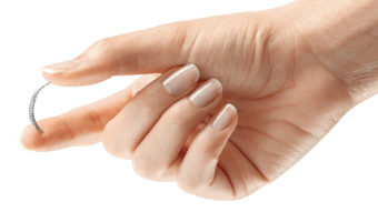 The Essure contraceptive device is placed in the fallopian tubes, where it causes scarring that blocks sperm from reaching eggs. Courtesy of Bayer HealthCare