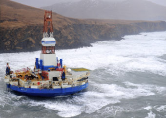 The Kulluk is an Arctic drill rig owned by Royal Dutch Shell. In 2012, the rig ran aground off Sitkalidak Island near Kodiak Island. The highly publicized incident was used by drilling opponents as an example of Shell's lack of qualifications to drill in the Arctic. (Photo by Petty Officer 1st Class Sara Francis/U.S. Coast Guard)