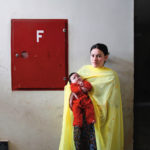 A woman with her child in the women's prison. 'Almond Garden, Portraits from the Women's Prisons in Afghanistan published by Daylight Books, April 2015. All right reserved. ©Gabriela Maj'