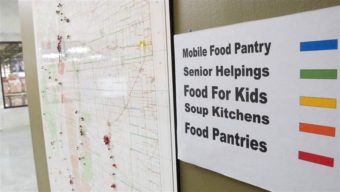 The Roadrunner Food Bank in Albuquerque offers a map that depicts food distribution points across the state. New Mexico nearly surpassed Mississippi last year as having the nation’s highest poverty rate. Susan Montoya Bryan/AP