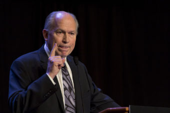 Gov. Bill Walker addresses the 49th annual Alaska Federation of Natives conference in Anchorage. (Photo by Mikko Wilson/KTOO)