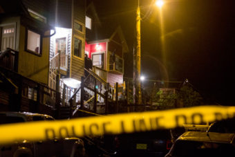 Juneau Police investigate the house of Juneau Mayor Greg Fisk on the evening of Monday November 30th. Photo by: Mikko Wilson / KTOO