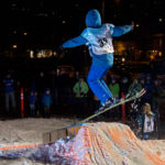 35 - Logan, catches air at the Downtown Rail Jam Dec. 19th. (Photo by Mikko Wilson/KTOO)