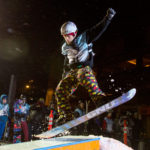 41 - Garrett, jumps at the Downtown Rail Jam Dec. 19th. (Photo by Mikko Wilson/KTOO)