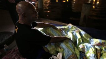 Homeless veteran James Thomas talks with officials in Miami. Miami-Dade County is one of hundreds of municipalities that had sought to end veteran homelessness by the end of this month. AP