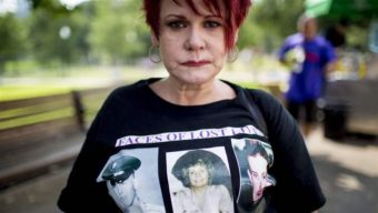 A woman at a Boston anti-drug rally wears a T-shirt showing family members killed by drug overdoses. As the country’s opioid epidemic worsens, few Americans are getting medication proven to be the best weapon against addiction. Getty Images