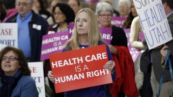Supporters of Republican Gov. Gary Herbert's Medicaid expansion plan rally at the Utah State Capitol. Legislators rejected his plan last year. This year, Herbert and other proponents of expansion may wait out the presidential election before pushing the issue again. AP