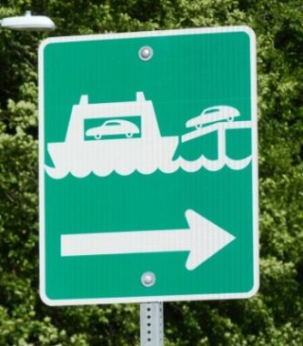 A sign along Juneau's Glacier Highway points to the Auke Bay Ferry Terminal (Photo by Ed Schoenfeld/CoastAlaska News)