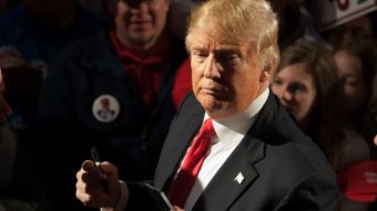 Republican presidential candidate Donald Trump signs autographs for supporters at the conclusion of a rally at Millington Regional Jetport on Saturday in Millington, Tenn. Michael B. Thomas/AFP/Getty Images
