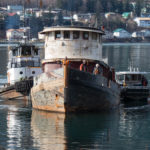The tug Challenger is towed to the beach to be demolished on March 7, 2016 (Photo by David Purdy/KTOO)