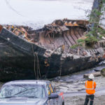 Excavators demolish the tug Challenger on March 8, 2016 (Photo by David Purdy/KTOO)