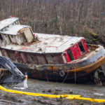 Excavators prepare to demolish the tug Challenger on March 7, 2016 (Photo by Mikko Wilson/KTOO)