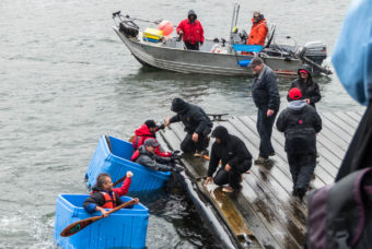 Two teams compete in the Taku Tote Races at the 2016 Juneau Maritime Festival (Photo by David Purdy/KTOO)