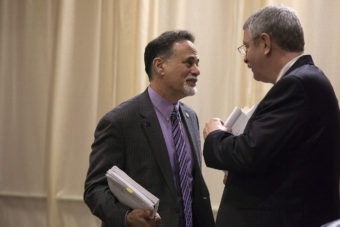Sen. Peter Micciche, R-Soldotna, and Rep. Dan Saddler, R-Eagle River, talk after a Senate floor session on Wednesday, May 18, 2016, in Juneau, Alaska. (Photo by Rashah McChesney/KTOO)