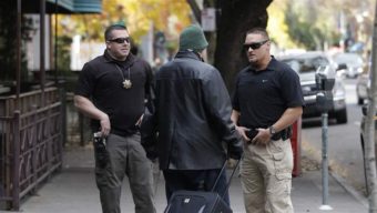 Parole agents in Sacramento talk with a sex-offender parolee they located using a global positioning device he wears. California has loosened its restrictions on where sex offenders can live. Other states are tightening their laws. AP