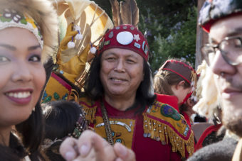 Fausto Paulo, from the Humpback Moon house in Yakutat waits for his group's turn to march during a processional and grand entrance on Wednesday, June 8, 2016, near Juneau, Alaska. Celebration is a biennial festival of Tlingit, Haida and Tsimshian tribal members put on by the Sealaska Heritage Institute. (Photo by Rashah McChesney/KTOO)