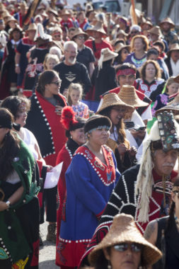 Hundreds gather to march during a processional and grand entrance on Wednesday, June 8, 2016, near Juneau, Alaska. Celebration is a biennial festival of Tlingit, Haida and Tsimshian tribal members put on by the Sealaska Heritage Institute. (Photo by Rashah McChesney/KTOO)
