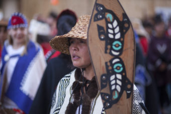 Hundreds gather to march during a processional and grand entrance on Wednesday, June 8, 2016, near Juneau, Alaska. Celebration is a biennial festival of Tlingit, Haida and Tsimshian tribal members put on by the Sealaska Heritage Institute. (Photo by Rashah McChesney/KTOO)