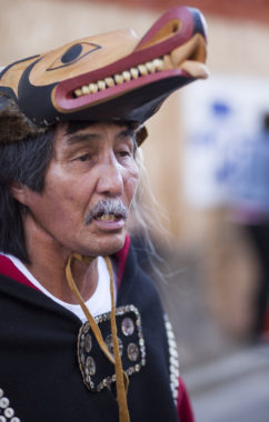 Hundreds gather to march during a processional and grand entrance on Wednesday, June 8, 2016, near Juneau, Alaska. Celebration is a biennial festival of Tlingit, Haida and Tsimshian tribal members put on by the Sealaska Heritage Institute. (Photo by Rashah McChesney/KTOO)