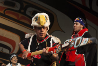 Hundreds gather to march during a processional and grand entrance on Wednesday, June 8, 2016, near Juneau, Alaska. Celebration is a biennial festival of Tlingit, Haida and Tsimshian tribal members put on by the Sealaska Heritage Institute. (Photo by Rashah McChesney/KTOO)