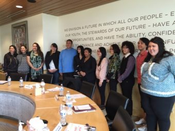 US Attorney General Loretta Lynch poses with a group of Alaska Native Youth. (Hillman/Alaska Public Media)