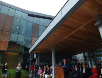 Juneau Sen. Dennis Egan addresses a crowd during grand opening of the Father Andrew P. Kashevaroff Library, Archives and Museum Building on June 6, 2016.