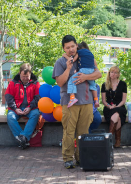 Alaska Native educator Lance Twitchell speaks Tlingit during the open mic portion of the Vigil for those affected by the shooting in Orlando. (Photo By Annie Bartholomew/KTOO)