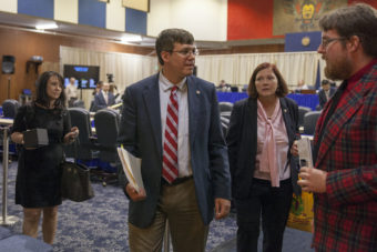 Sen. Bill Wielechowski, D-Anchorage, stops to talk with a reporter after a floor session during the fifth special session of Alaska's Legislature in the last two years on July 11, 2016 in Juneau, Alaska. (Photo by Rashah McChesney/KTOO)