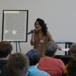 Christy NaMee Eriksen speaks to the audience. (Photo by Quinton Chandler/KTOO)