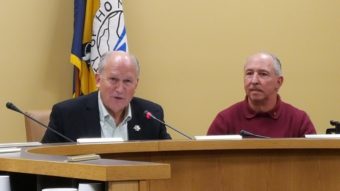 Governor Walker Addresses Homer City Council alongside Council Member Bryan Zak on Tuesday, August 2. (Shahla Farzan, KBBI)