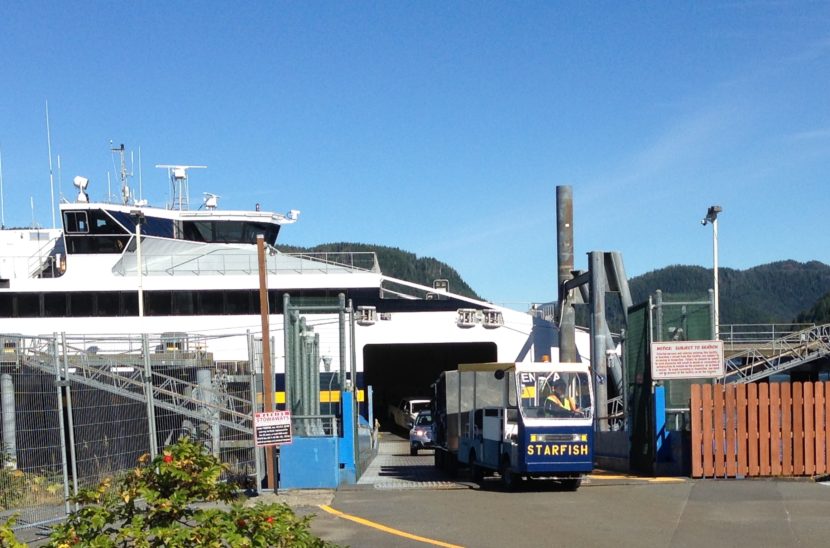 A baggage cart, nicknamed Starfish, leaves the Chenega in Sitka Sept. 3, 2015. The fast ferry is tied up for most of this fiscal year. (Photo by Ed Schoenfeld/CoastAlaska News)