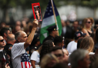 A commemoration ceremony is held for the victims of the Sept. 11 terrorist attacks on Sunday at the National September 11 Memorial and Museum in New York City. Spencer Platt /Getty Images