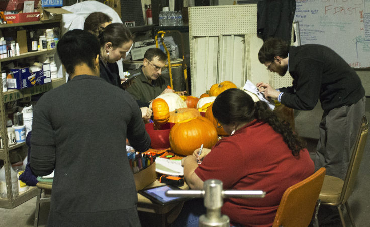 Juneau Makerspace members and participants carve pumpkins on Monday, October 24, 2016. The group hosts open studio nights every Monday night, except on holidays. (Photo by Tripp J Crouse/KTOO)