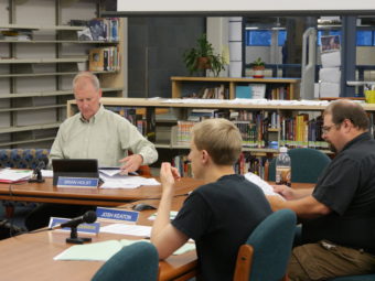 Brian Holst (left) is president of the Juneau School Board.