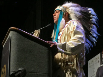 Yakama Chairman JoDe Goudy speaks to a crowd AT THE Alaska Federation of Natives Convention in Fairbanks, Alaska. (Photo by Emily Schwing/Northwest News Network)