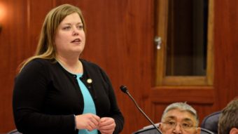 Rep. Geran Tarr addresses the Alaska House of Representatives on April 7, 2014. Tarr and Andy Josephson will replace Benjamin Nageak (seated) and David Talerico as the co-chairs of the House Resources Committee. (Photo by Skip Gray/360 North)