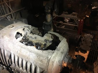 Emmonak's vacuum pump number one, which overheated and then burned through its metal casing and through the roof of the water-sewer plant. (Photo by Adrian Wagner/KYUK)