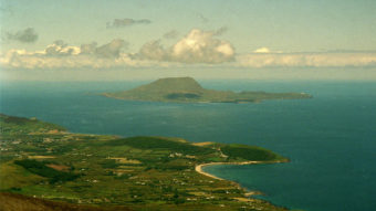 The view from a peak in County Mayo, Ireland. An island off the coast is inviting any Americans afraid of the election results to move there, and grow their population. David Pace/AP