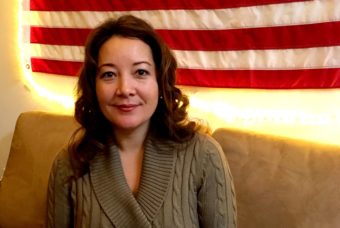 Genevieve Chase, an Army vet from Idaho, in the DC office of Alaska Wilderness League. (Photo by Liz Ruskin/Alaska Public Media)