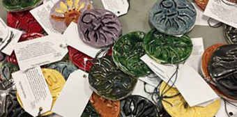 Some of the ornaments made at Bean’s Cafe as part of a project funded by the Alaska Mental Health Trust Authority. (Photo by Anne Hillman/Alaska Public Media)
