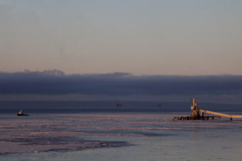 Cook Inlet oil platforms are visible from shore on Dec. 13, 2016 near Kenai, Alaska.