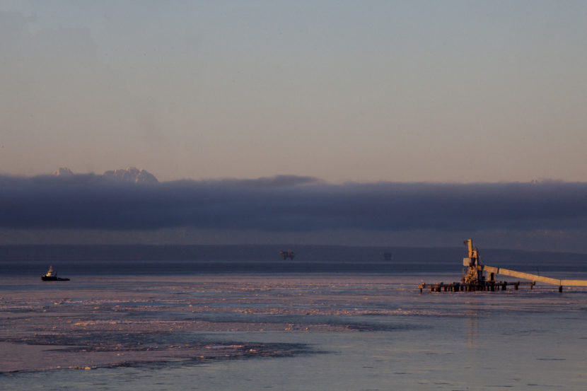 Cook Inlet oil platforms are visible from shore on Dec. 13, 2016 near Kenai, Alaska.