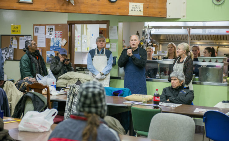 Gov Bill Walker and policy adviser Rebecca Braun volunteer at the Glory Hole soup kitchen and shelter on Friday, Dec. 30, 2016.