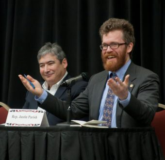 Rep. Justin Parish, D-Juneau, speaks at a Native Issues Forum in Juneau on Feb. 2, 2017. Rep. Sam Kito III, D-Juneau, is also pictured.