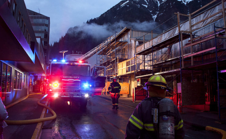 Firefighters and emergency personnel work the scene of a possible fire Saturday night, April 15, 2017, in the 200 block of Seward Street, downtown Juneau. (Photo courtesy Tripp J Crouse)