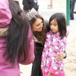 Abbi Cordero takes a picture of her daughter Bianca Cordero with Miss Alaska USA Alyssa London on Thursday, May 25, 2017, at Sandy Beach in Douglas.