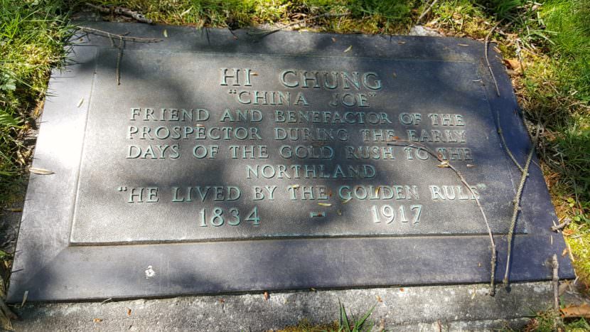 The grave marker for China Joe is located in the pioneer section of Evergreen Cemetery in Juneau. (Photo by Tripp J Crouse/KTOO)